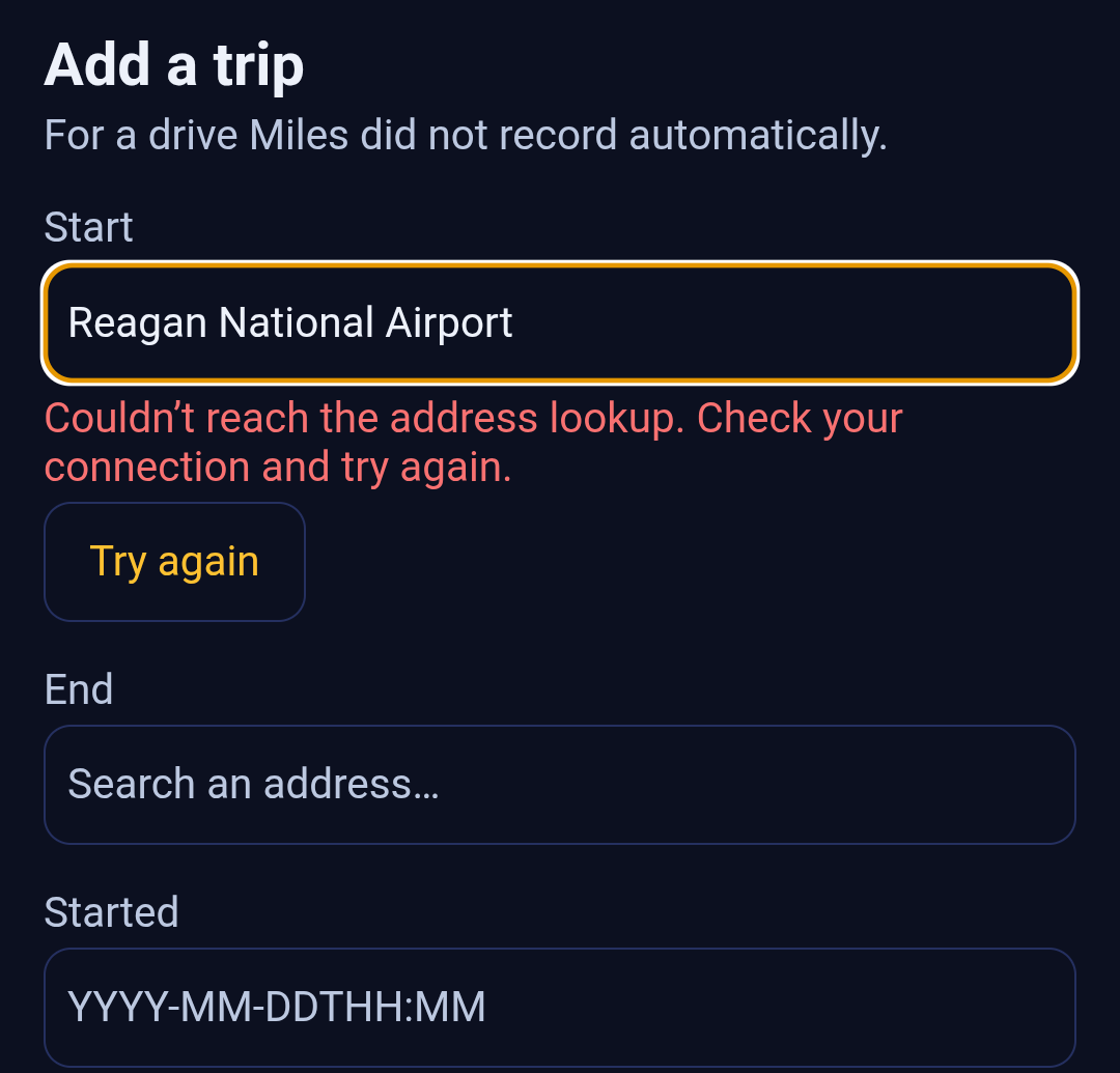 The top of the Add a trip form in Backbuild Miles with no connection, in the app's dark theme. The Start field contains the typed text Reagan National Airport and is outlined in yellow as the focused field. Underneath it, in red, is the message Couldn't reach the address lookup. Check your connection and try again, followed by a Try again button. Below that the End field still shows its Search an address placeholder and the Started field its YYYY-MM-DDTHH:MM placeholder.