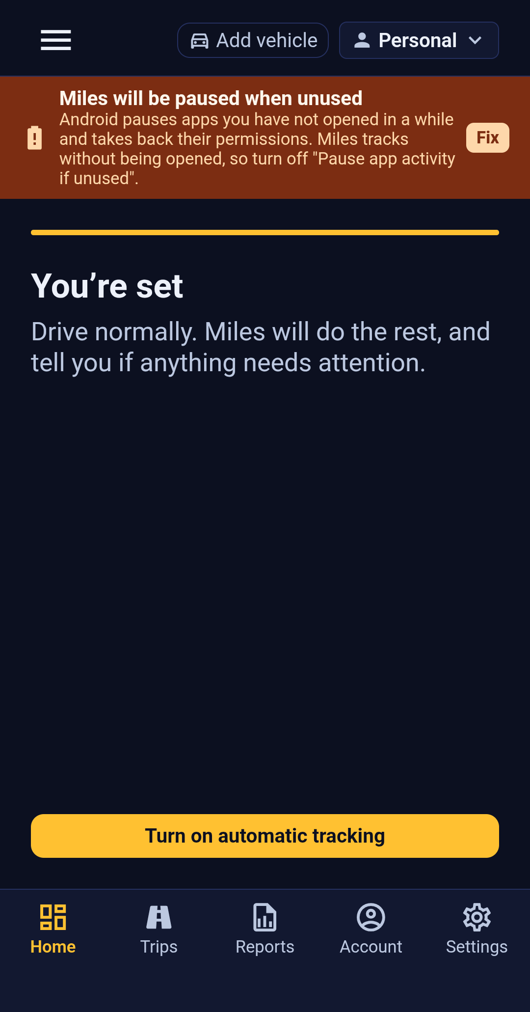 The final stage of the Backbuild Miles setup wizard. The heading reads You're set and the text reads Drive normally. Miles will do the rest, and tell you if anything needs attention. A full-width button at the bottom reads Turn on automatic tracking. A banner above warns that Miles will be paused when unused, with a Fix action.